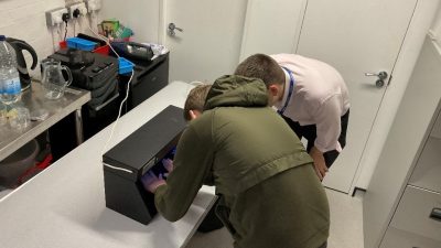 Dan inspecting an appliance