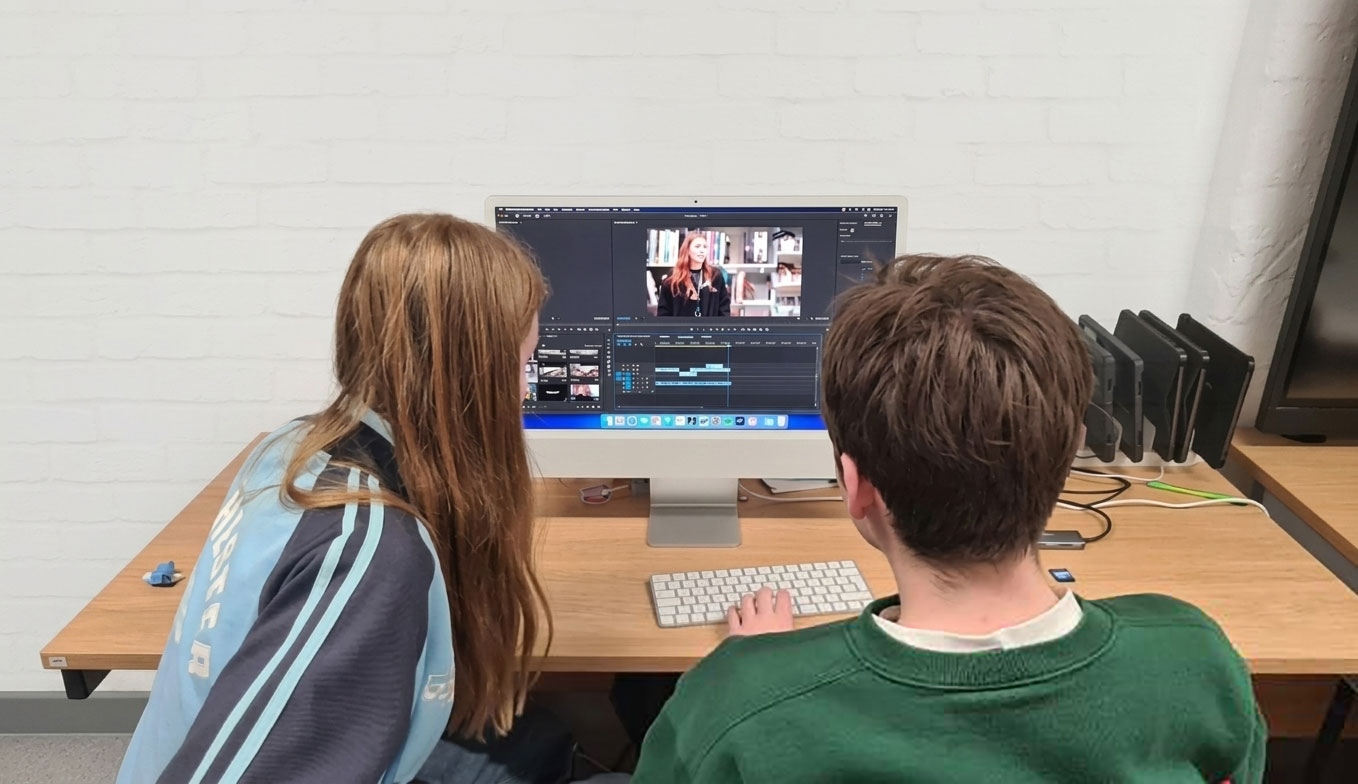 Young creatives editing video on computer