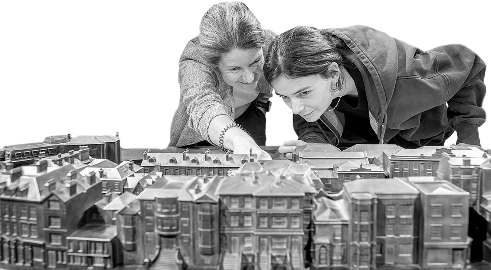 Looking-at-model-7 2 females looking at town model